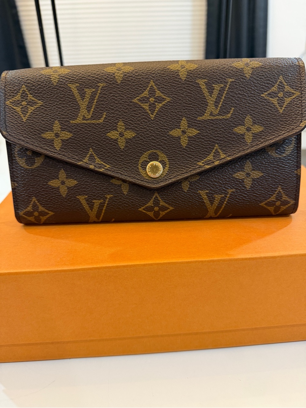 Louis Vuitton Monogram Sarah Wallet in Brown